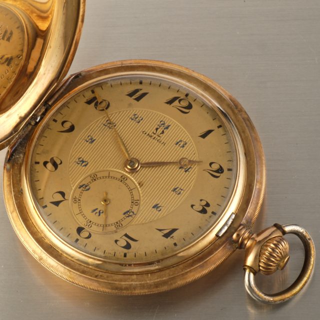 Omega gold hunter pocket watch